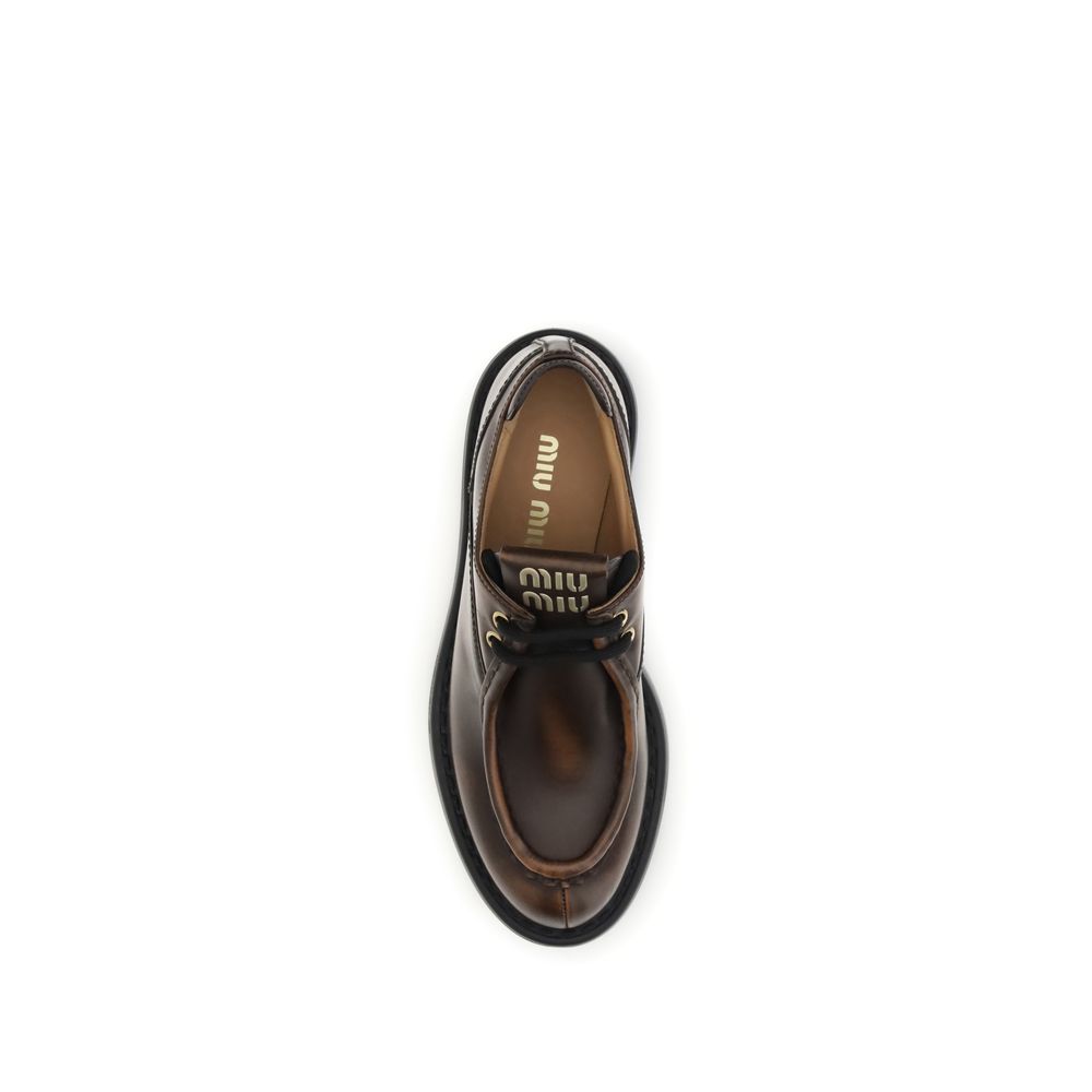 Miu Miu Brown Calf Leather Bos Taurus Platform Loafers